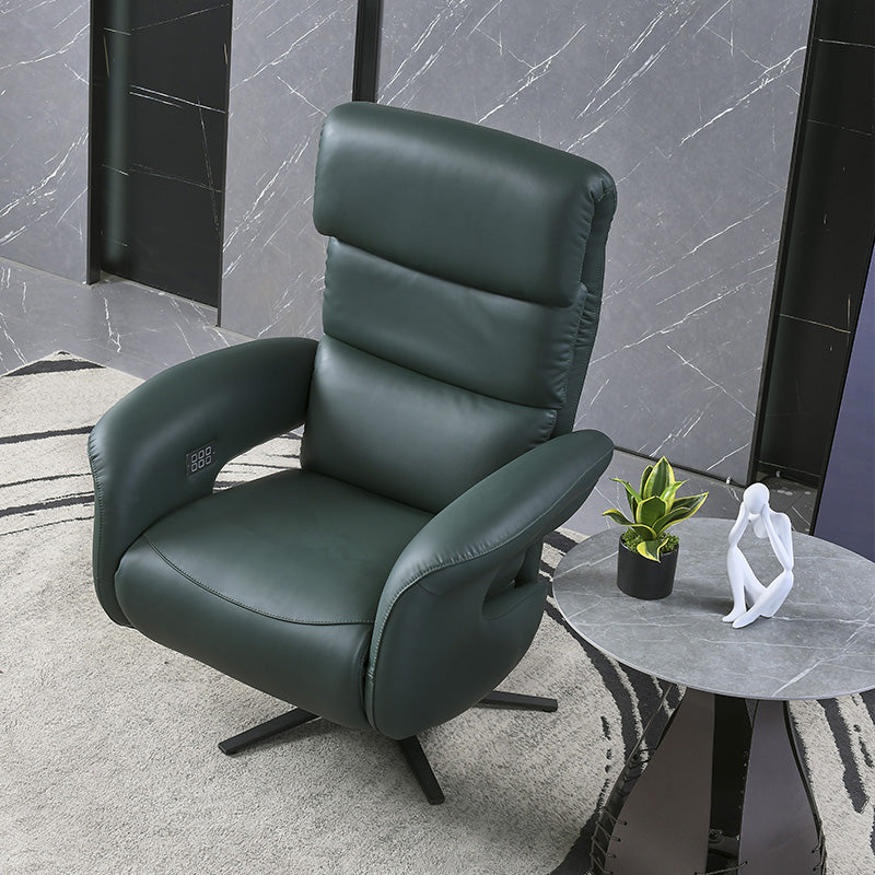 dark green electric chair with armrests